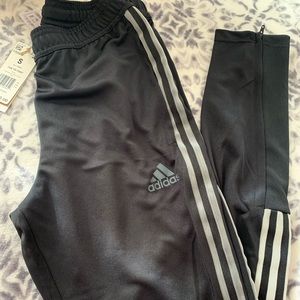 Black and gray adidas pants